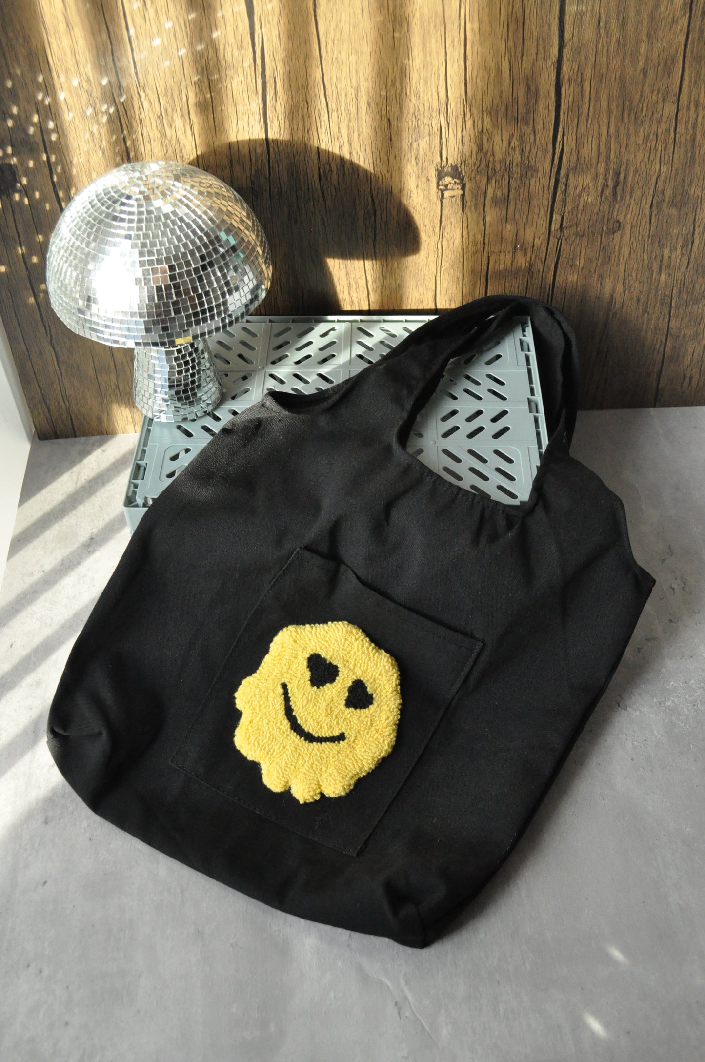 Melted Smiley Face Tote Bag