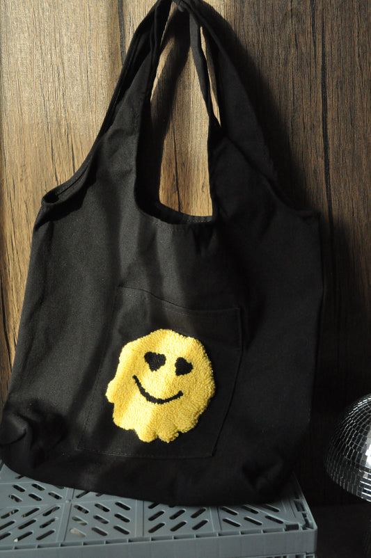 Melted Smiley Face Tote Bag
